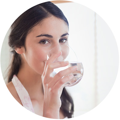 Woman drinking water round